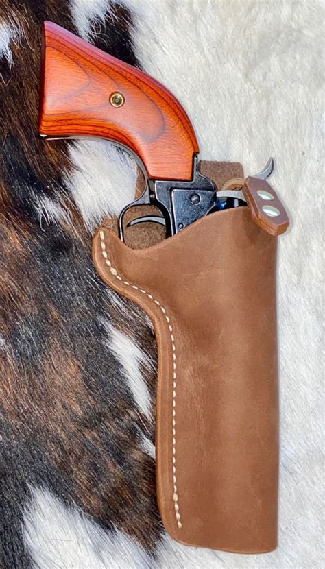 Belt is quite stiff and will need to be broken in but excellent price for a belt and holster of this quality. . Best holster for heritage rough rider 22